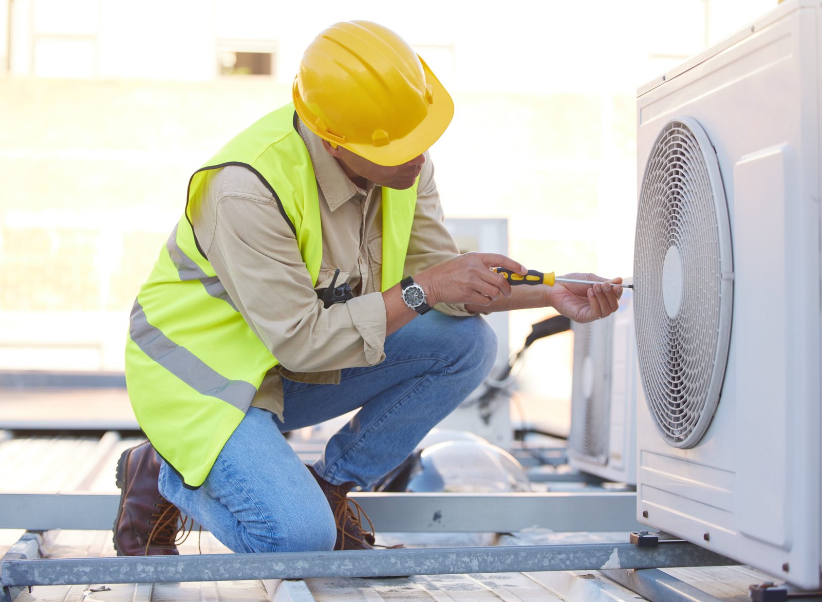 Air conditioning, technician or engineer on roof for maintenance, building or construction of fan h.